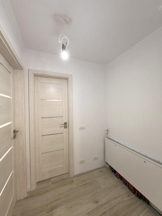 Apartament cu 3 camere, decomandat, 65mp, etaj 1 - zona Dambovita – fotografia 13 din 18