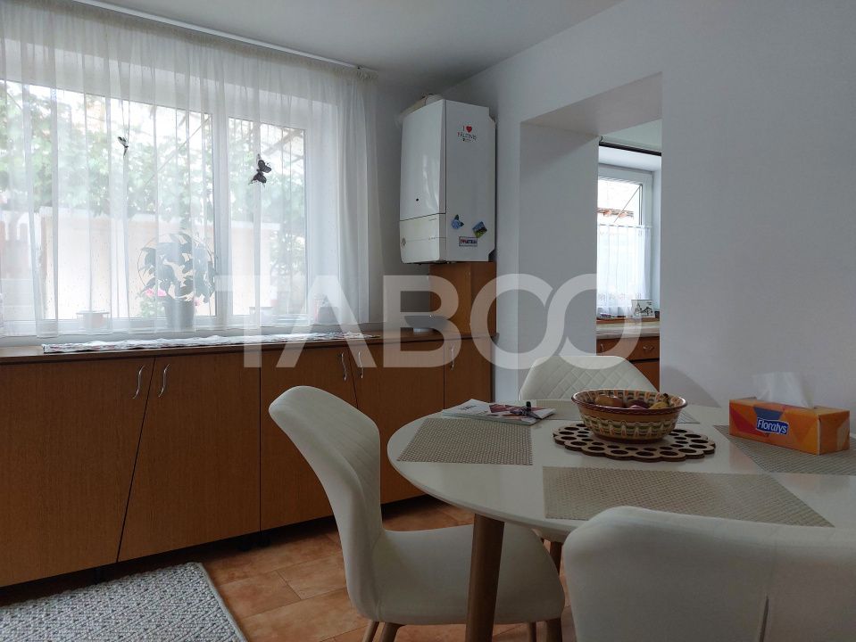 Casa 109 mp 4 camere pivnita terasa loc parcare curte comuna Cisnadie – fotografia 9 din 24