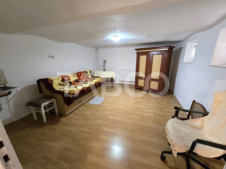Casa individuala de vanzare cu teren 237 mp garaj in zona Lupeni Sibiu – fotografia 28 din 32
