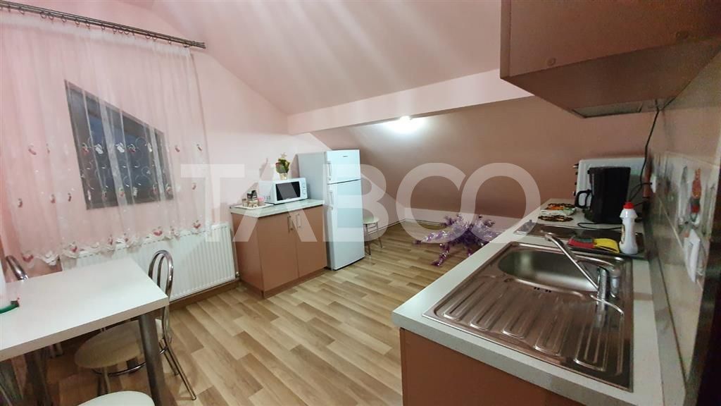 Apartament de inchiriat  56 mpu 2 camere mansarda in vila Selimbar – fotografia 5 din 11