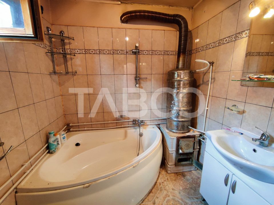 Comision 0% Casa de vanzare 4 camere 2 bai teren 266 mp Saliste Sibiu – fotografia 15 din 16