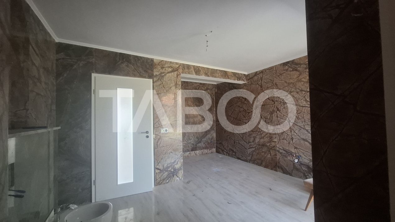 Casa de vanzare 405 mp utili 2 garaje 250 mp terase Slimnic Sibiu – fotografia 4 din 19