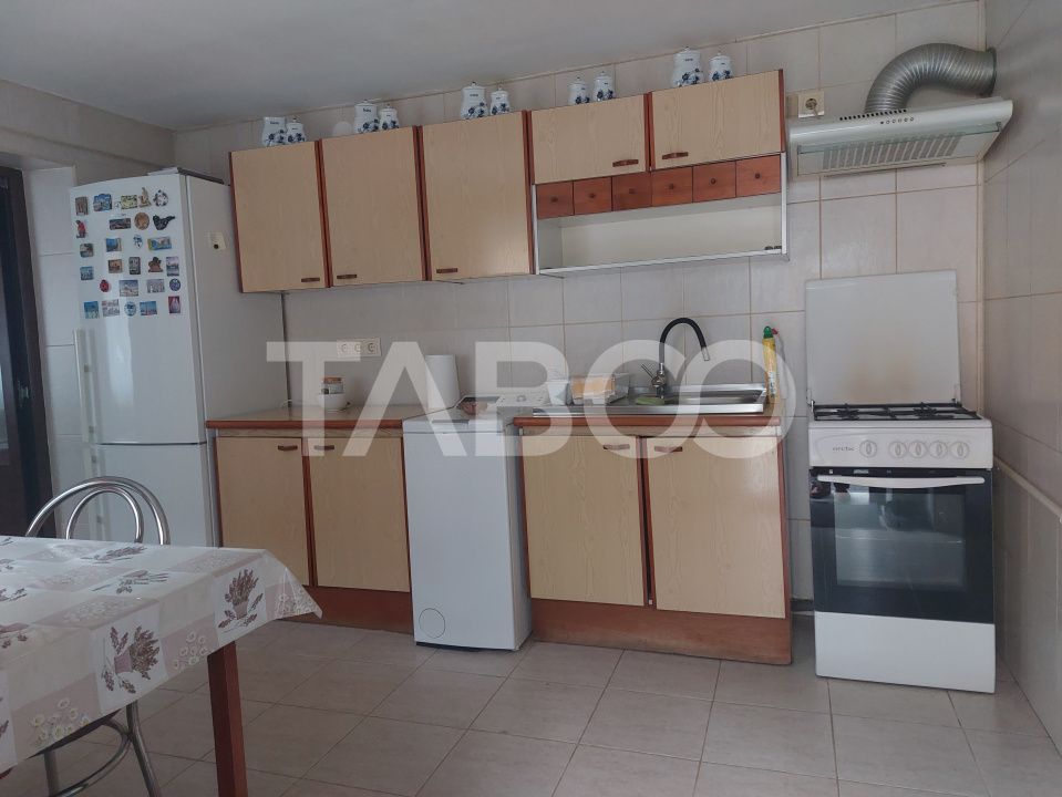 Apartament la casa 119 mpu 5 camere 2 bucatarii 3 bai gradina Cisnadie – fotografia 6 din 19