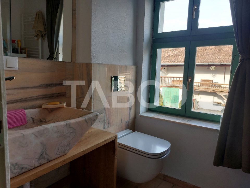 Apartament de vanzare 105 mp 3 camere curte 340 mp in acte Cisnadie – fotografia 19 din 27