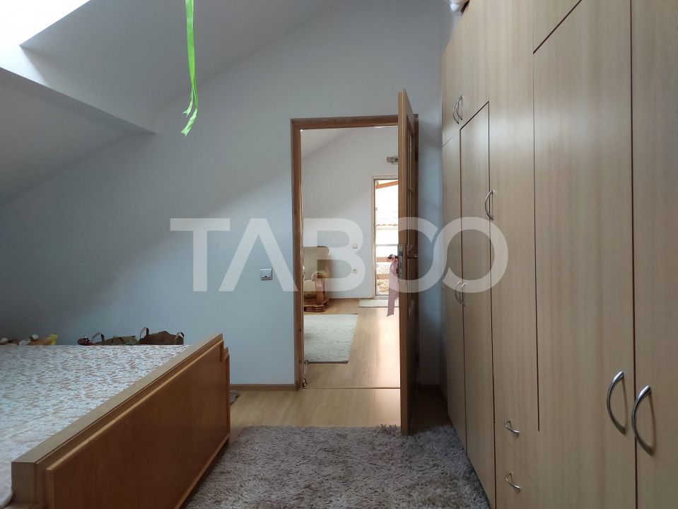 Casa 109 mp 4 camere pivnita terasa loc parcare curte comuna Cisnadie – fotografia 14 din 24