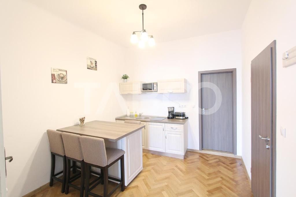 4 garsoniere pregatite pentru regim hotelier in Centrul Istoric Sibiu – fotografia 5 din 31