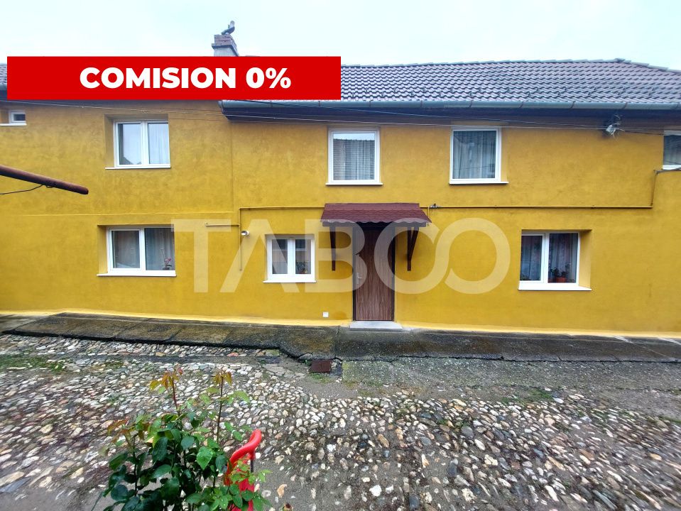 Casa in zona centrala 5 camere 2 bucatarii 3 bai curte comuna Cisnadie – fotografia 1 din 28
