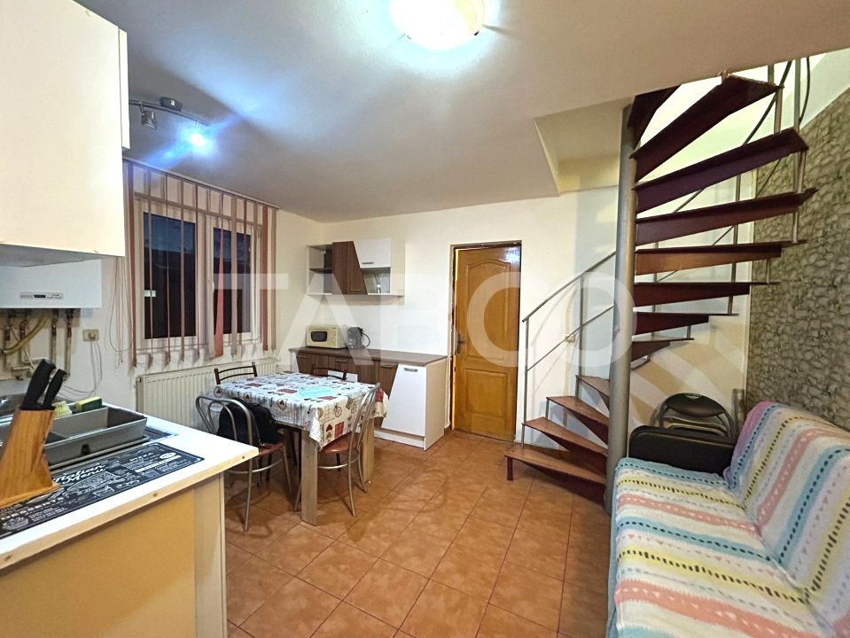 Apartament la mansarda de vanzare 4 camere decomandate Rahovei – fotografia 1 din 10