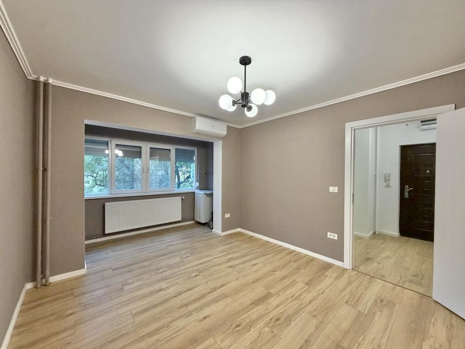 Apartament renovat complet, 2 camere, etaj 1- zona Gheorghe Lazar – fotografia 1 din 10