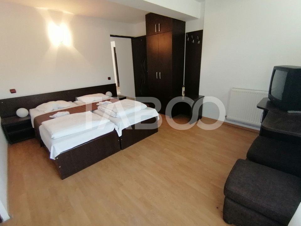 Pensiune 13 camere 16 bai sauna piscina si teren 1565 mp Cisnadioara – fotografia 10 din 42
