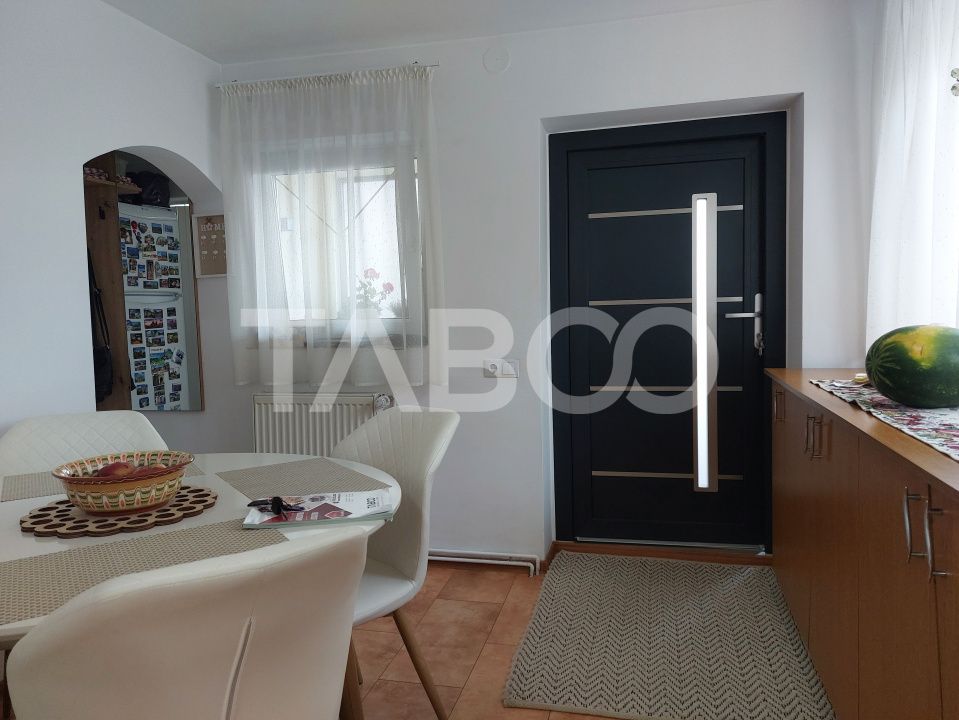 Casa 109 mp 4 camere pivnita terasa loc parcare curte comuna Cisnadie – fotografia 7 din 24