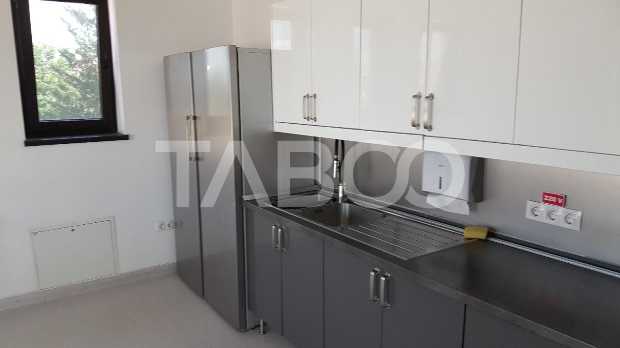 Cladire moderna cu teren 890 mp P+2E+ET birouri si spatiu comercial – fotografia 9 din 14