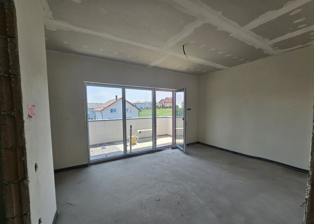 Casa individuala cu garaj si terase generoase in Chinteni – fotografia 15 din 21