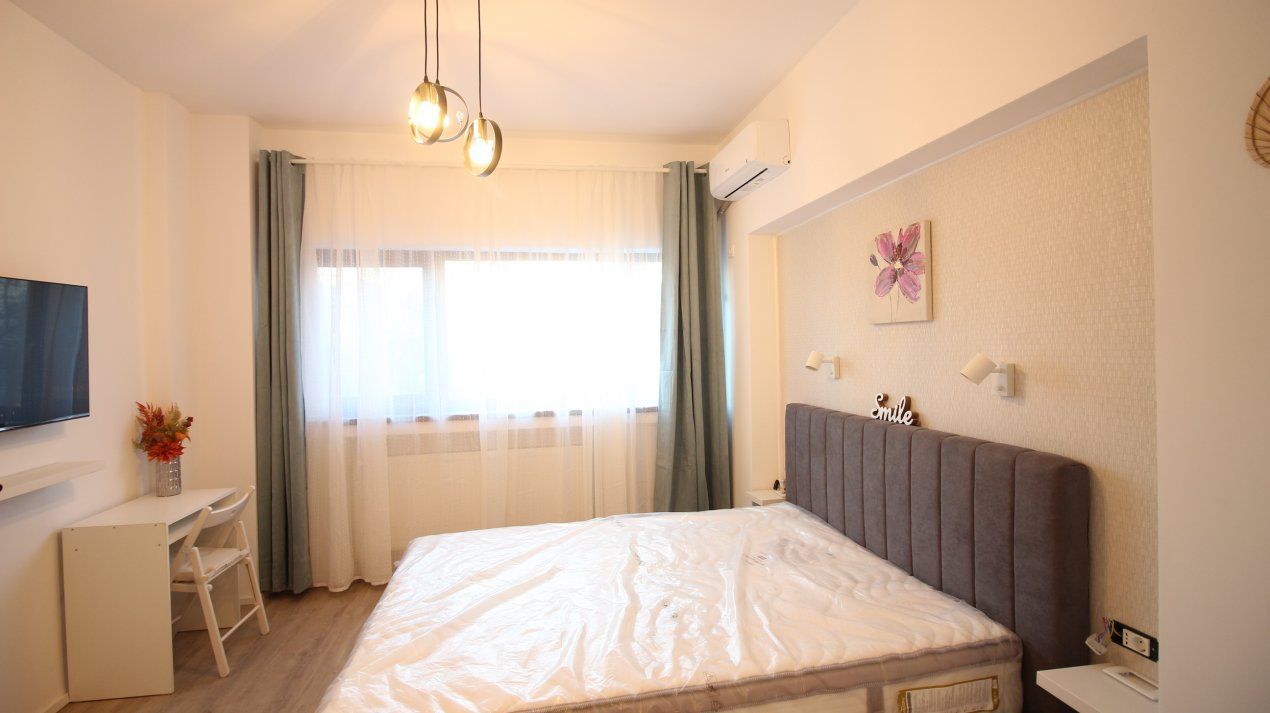 Piața Universității – 2 camere, 2 băi, mobilate modern, etaj 1/8, ideale Airbnb – fotografia 1 din 24