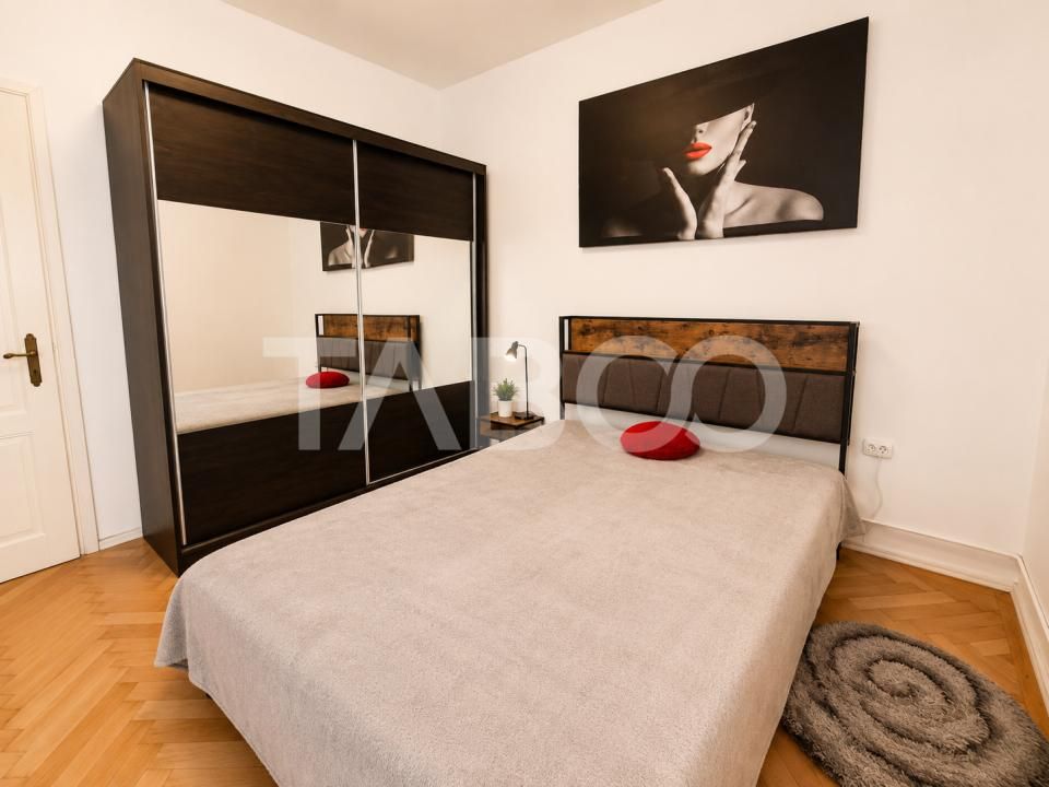 Garsoniera de vanzare aproape de centru cu bucatarie separata – fotografia 1 din 19