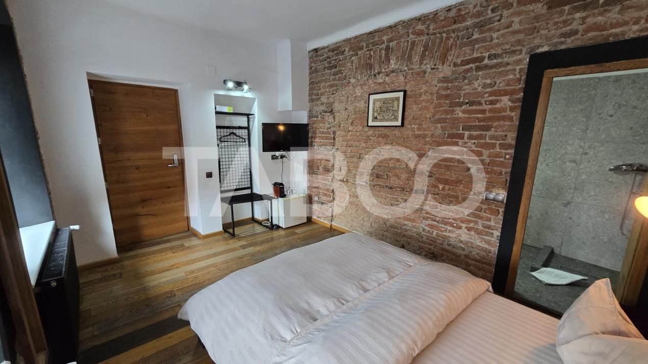 Doua garsoniere de vanzare pentru regim hotelier zona Orasului De jos – fotografia 9 din 12
