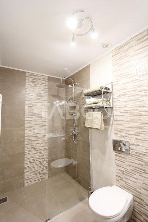 4 garsoniere pregatite pentru regim hotelier in Centrul Istoric Sibiu – fotografia 19 din 31