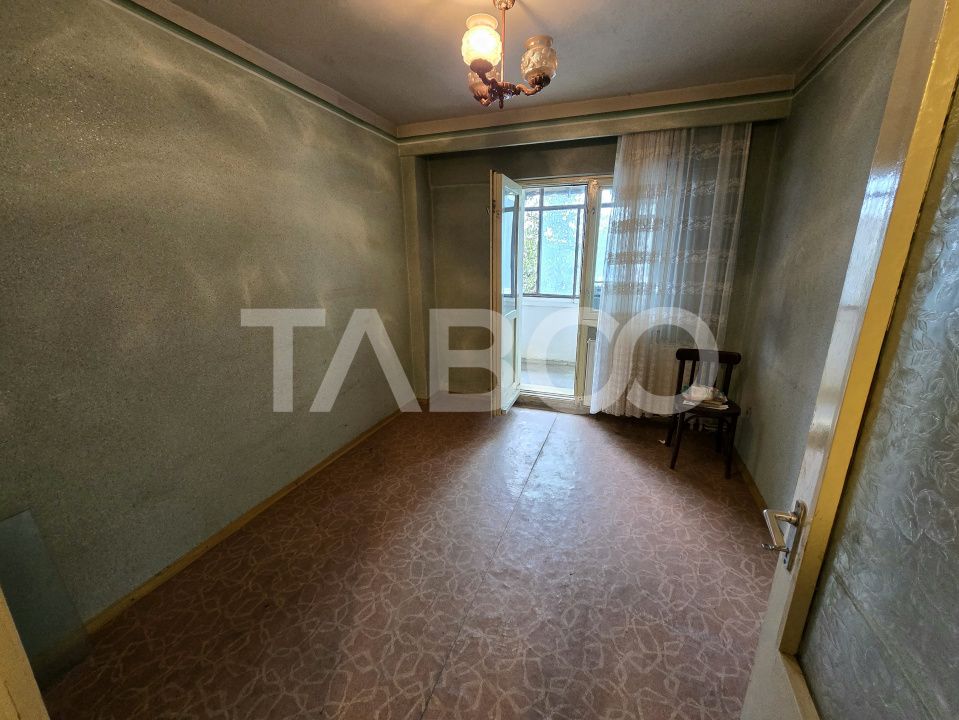 Apartament decomandat 4 camere 4 balcoane 2 bai etaj 1 Central Sibiu – fotografia 10 din 22
