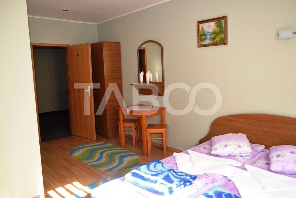 Pensiune de vanzare in Talmaciu judetul Sibiu renovata cu 26 camere – fotografia 15 din 27