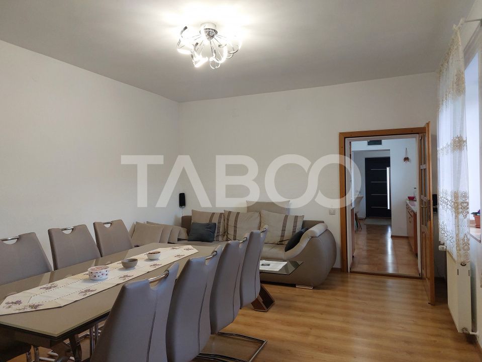 Casa 109 mp 4 camere pivnita terasa loc parcare curte comuna Cisnadie – fotografia 13 din 24