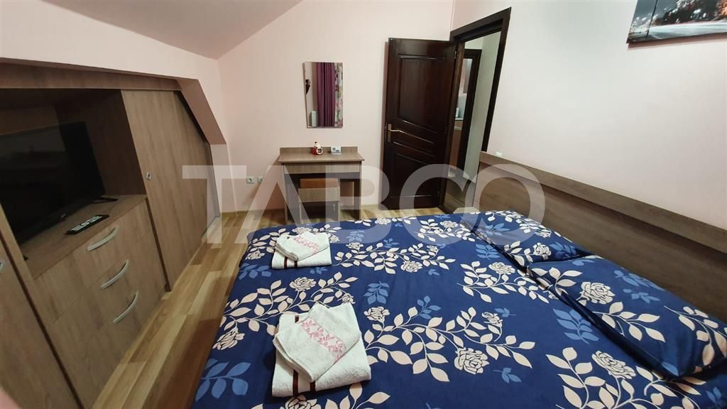 Apartament de inchiriat  56 mpu 2 camere mansarda in vila Selimbar – fotografia 3 din 11